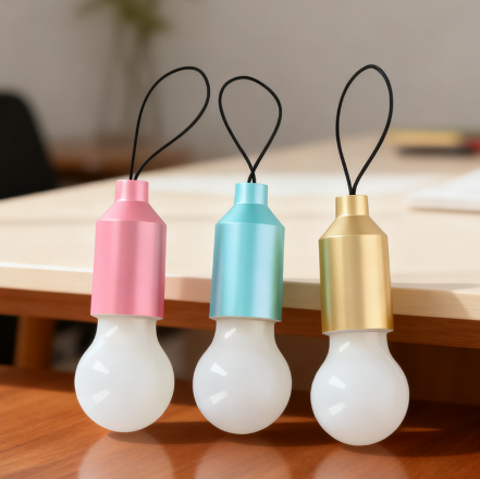 Small LED Light Bulb Shape Keychain Pull Switch 5.5cm Random Colours